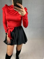 Пола с ефектна червена панделка KEITI в черно